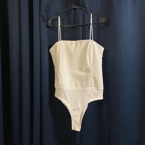 Faux-leather Sleeveless Bodysuit In Cream